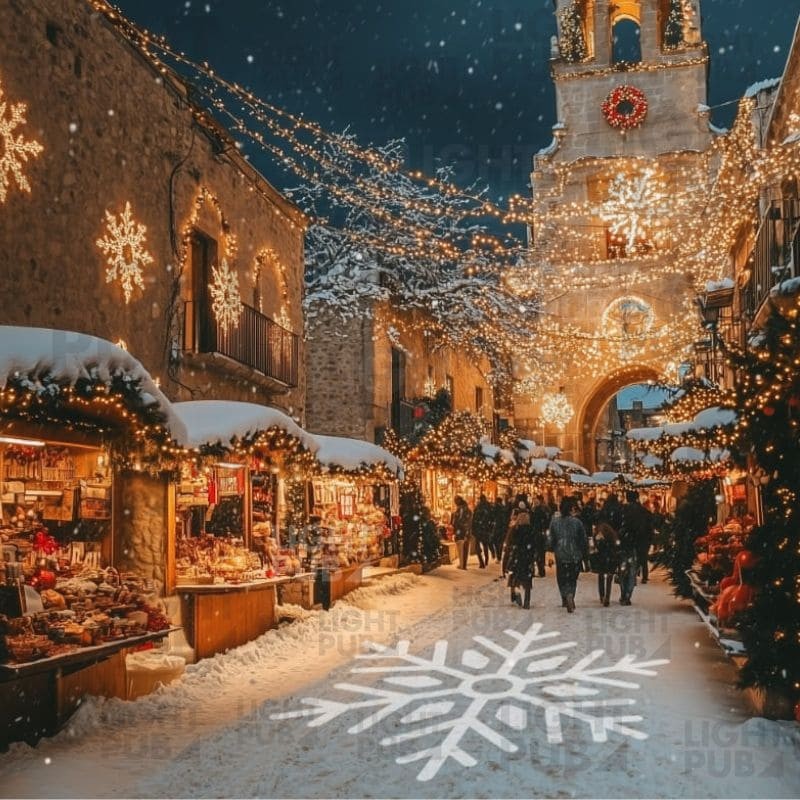 Illumination de Noël par projection de flocon de neige lumineux au sol